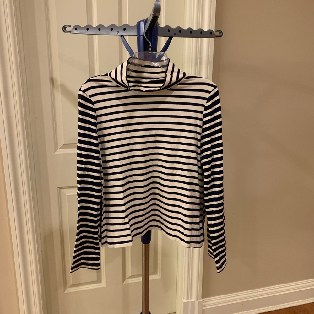 Navy and white striped top.
